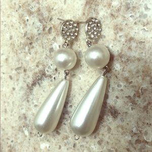 Pearl earrings.